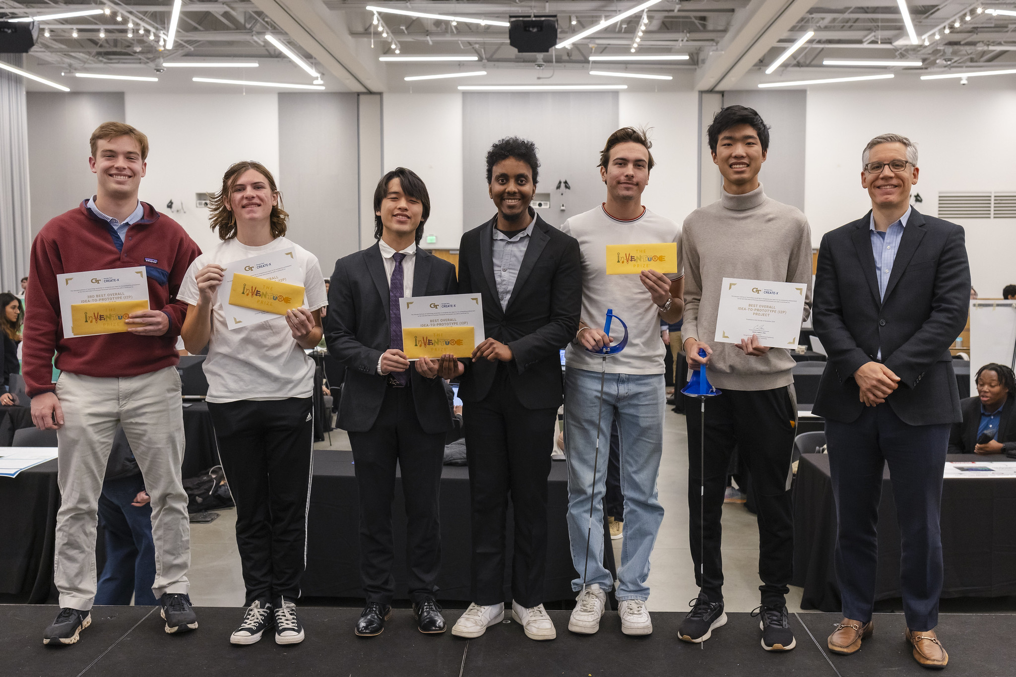 The winners of the Fall 2024 I2P Showcase stand together in Exhibition Hall.SuperStream: John-Wright StanlyConvexity Electronics: Calla Scotch, Levi Bloch, Phi CaiSoul: Ashraf Mansour, Benjamin Wilson, Michal GregusAllez Go: Adam Kulikowski, Jason MoCraig Forest, Associate Director of Make&nbsp;